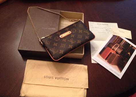 louis vuitton milla mm monogram wristlet